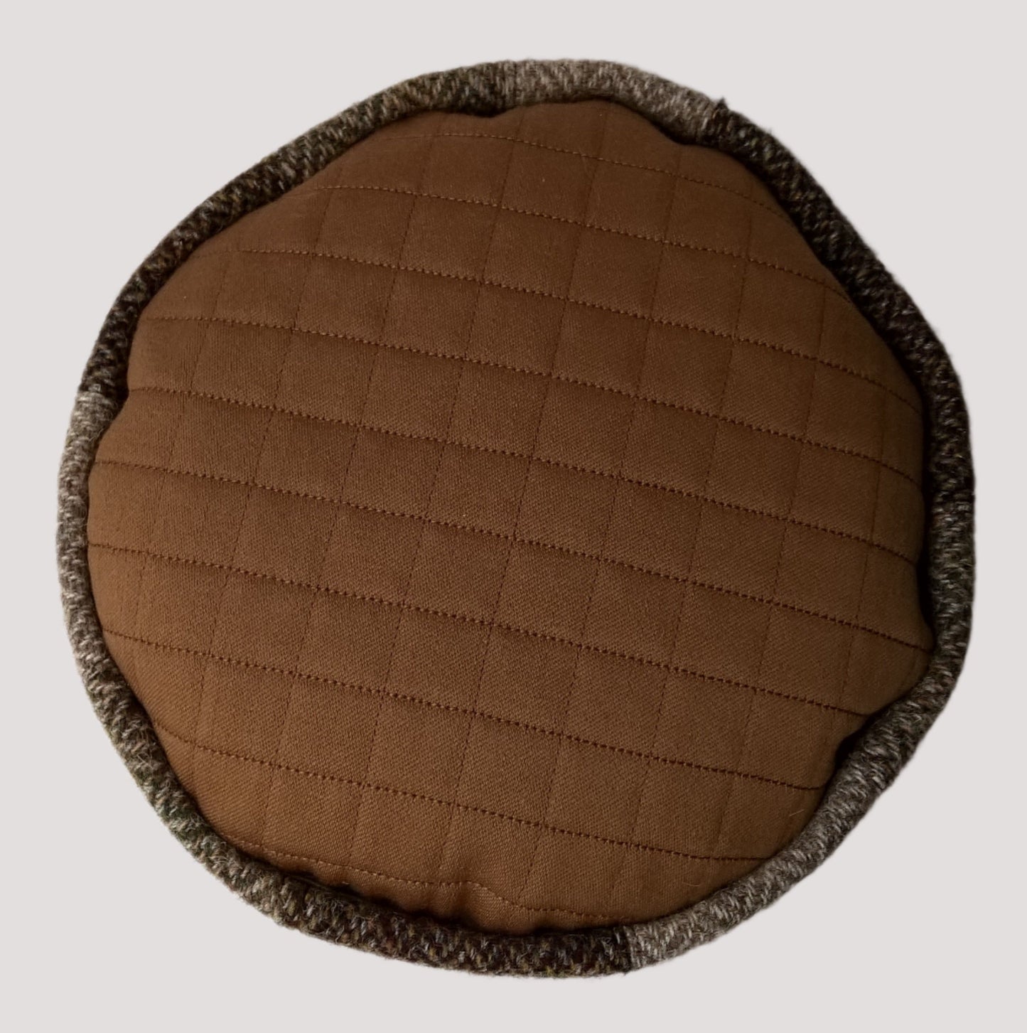 The tip of the pillbox hat is quilted to pure merino wool, both warm and breathable