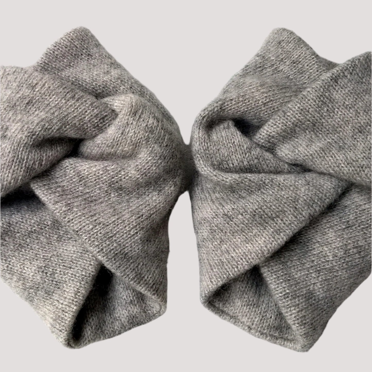 Double thickness handmade pure cashmere wrist warmers in light grey marl.