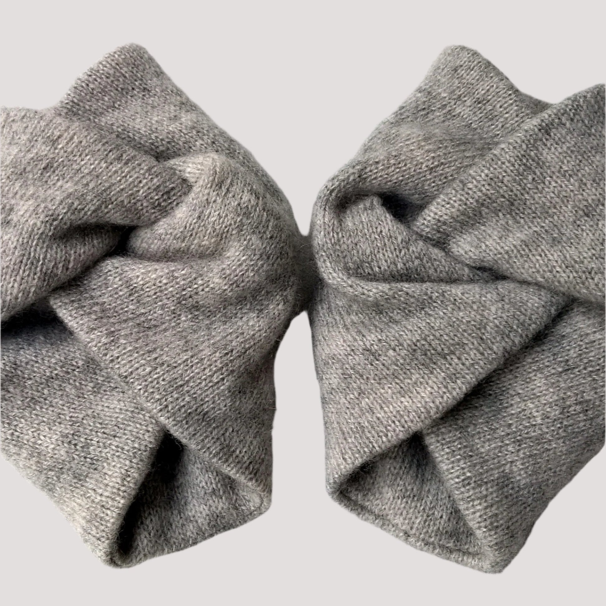 Double thickness handmade pure cashmere wrist warmers in light grey marl.