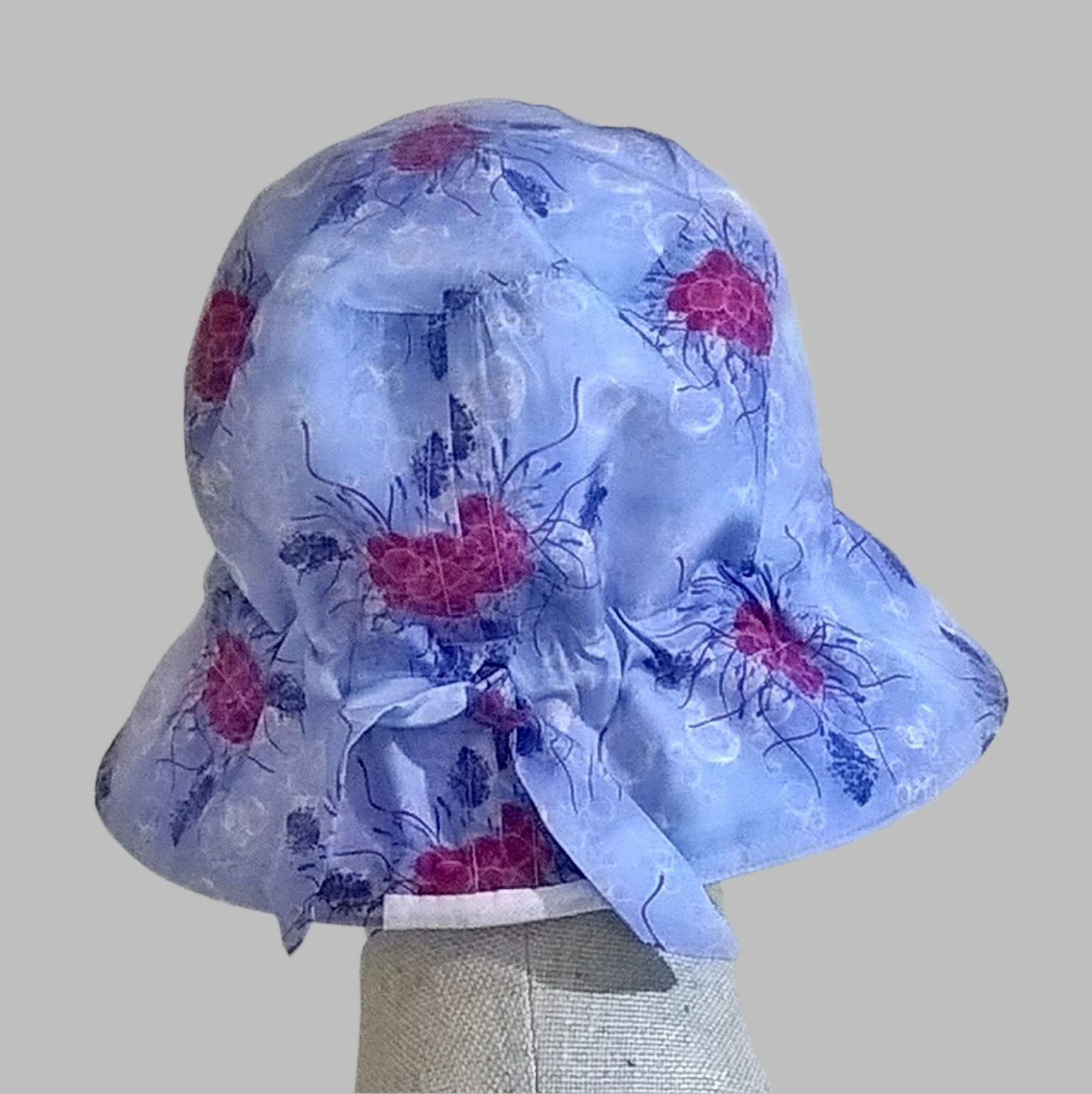Adjustable tie detail at back of cotton silk bucket hat