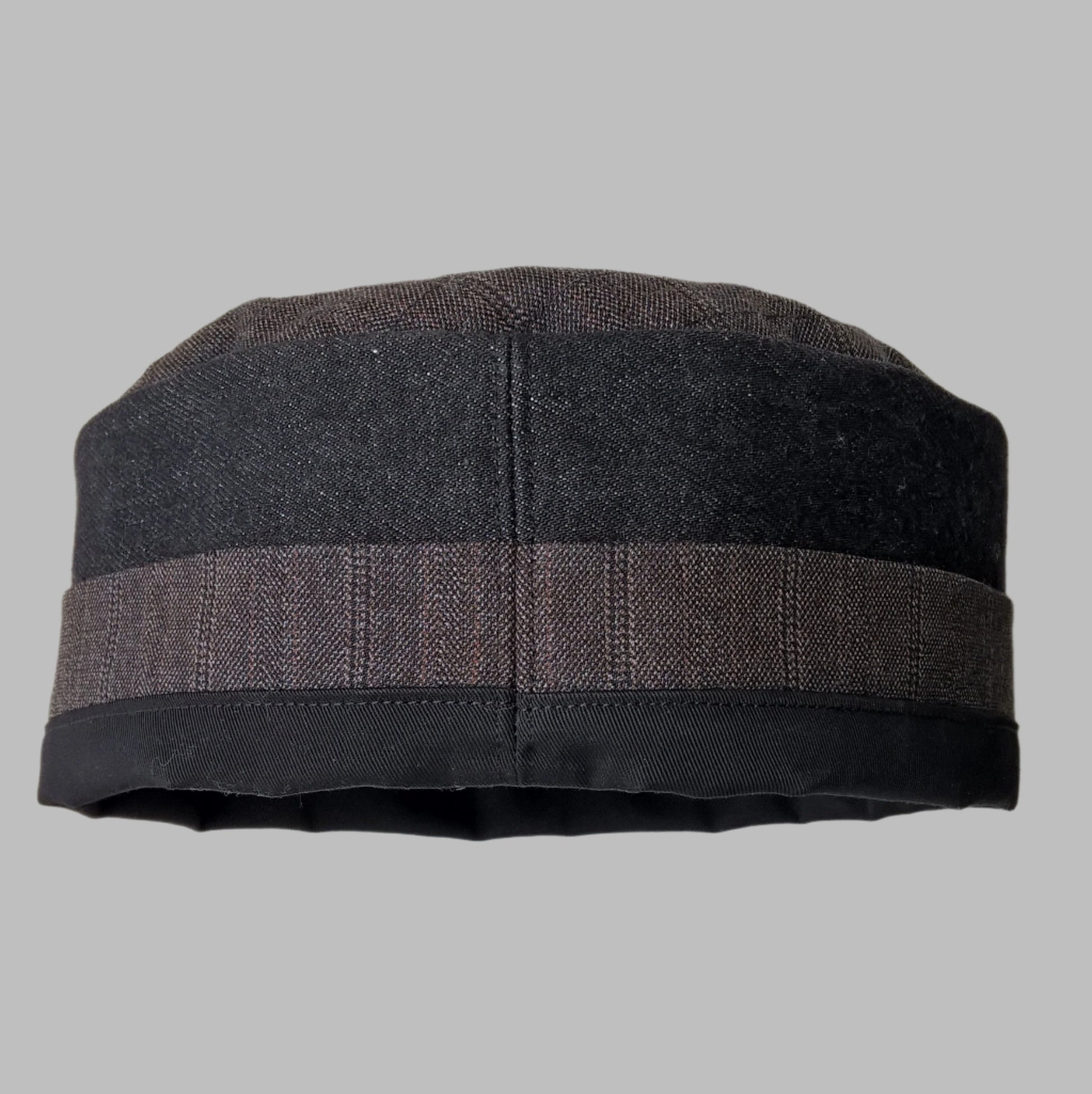 Back view of breathable brimless pillbox cap handmade in blended wool cashmere pinstripe, black denim and cotton twill 