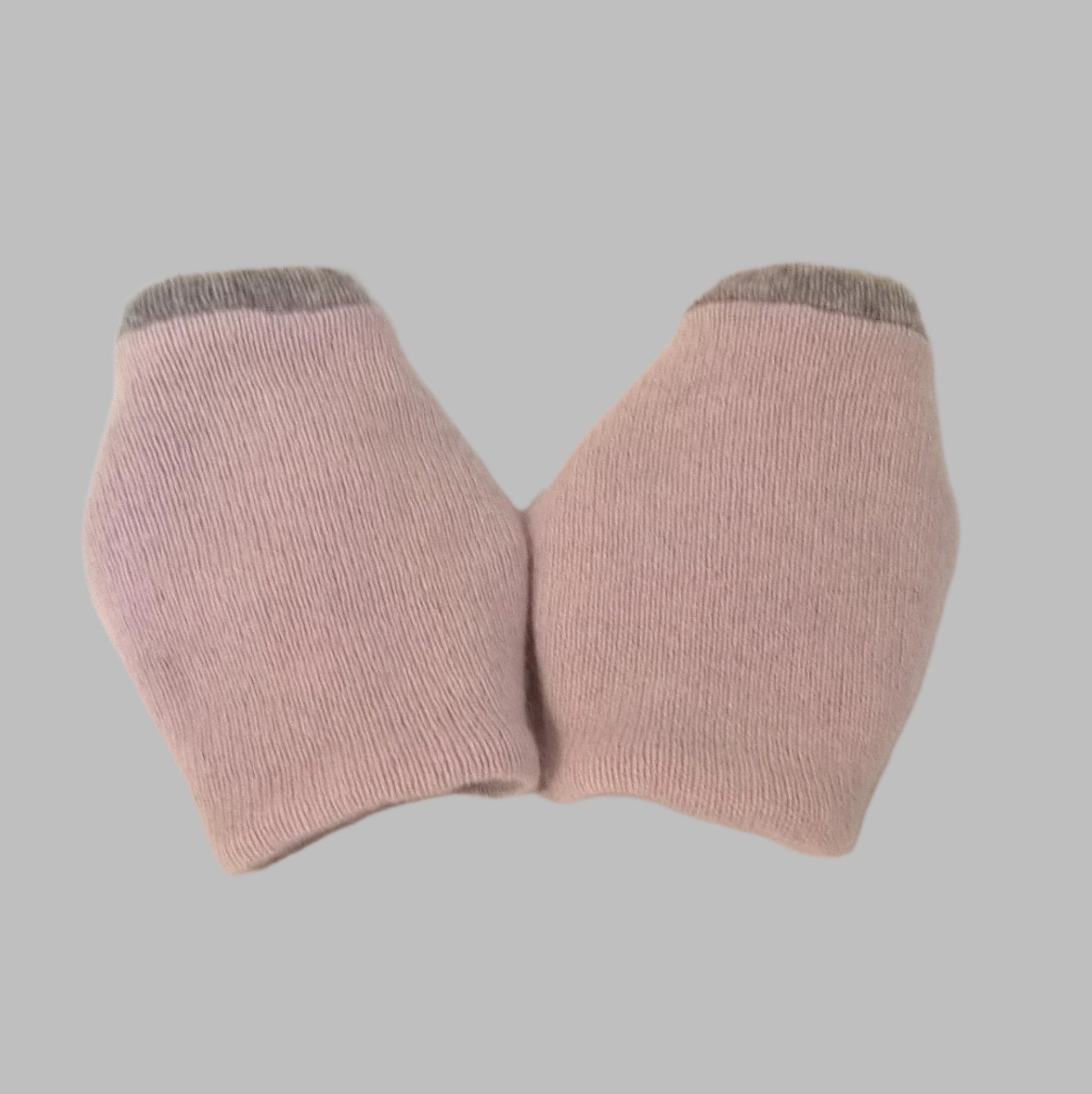 Back view of dusky pink with grey pure cashmere wrist warmer cuffs, handmade from up-cycled sweaters