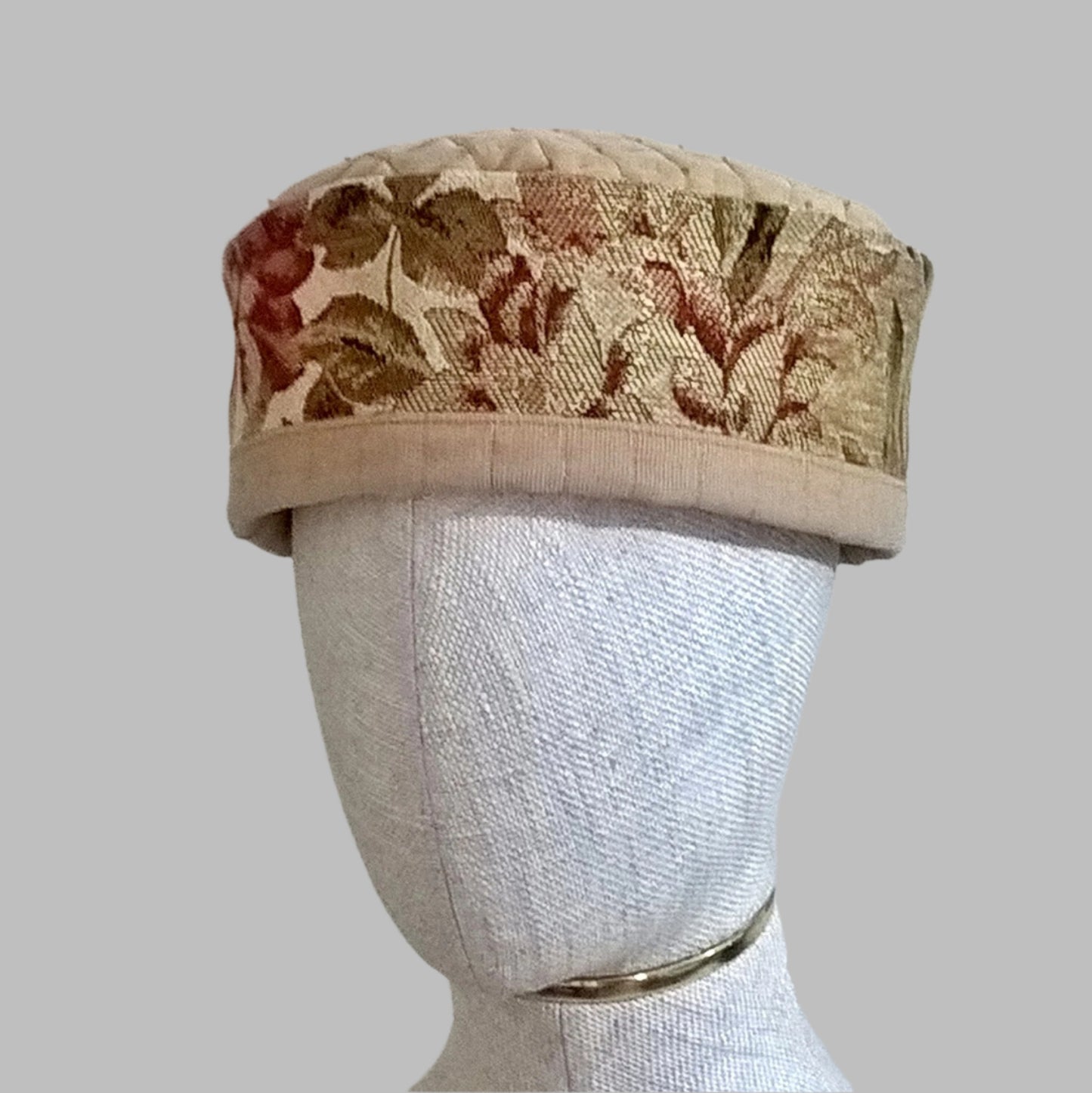 Quilted floral tapestry pillbox cap with beaded tip