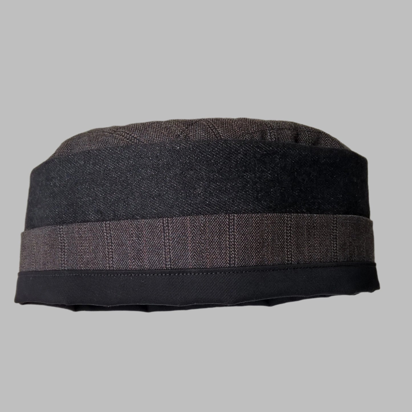 Brimless pillbox cap handmade in breathable fabrics of blended wool cashmere pinstripe, black denim and cotton twill 