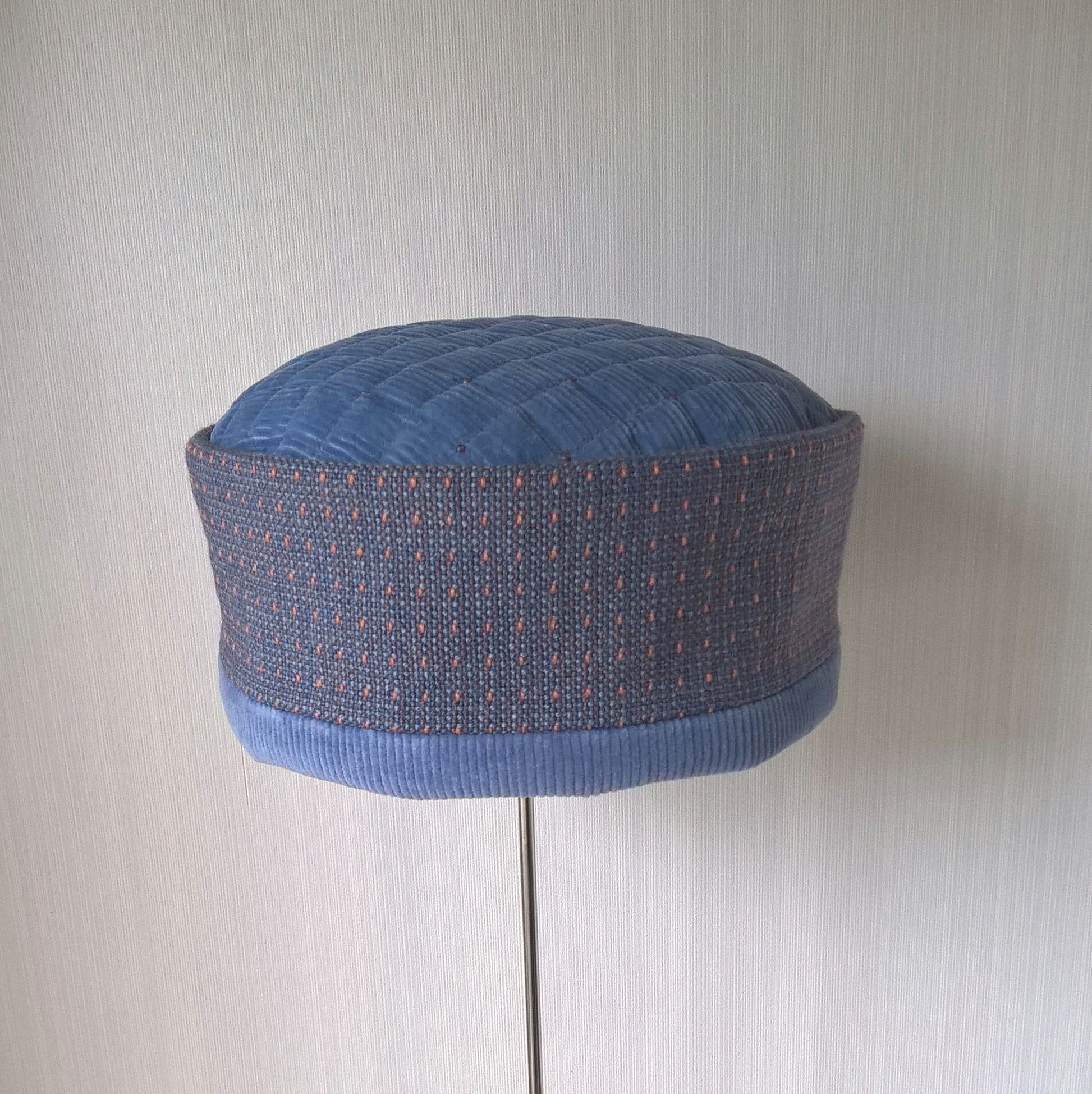 Blue corduroy brimless hat with quilted and  beaded tip