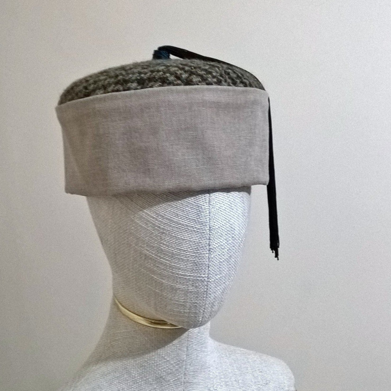 Brown and beige Harris Tweed Smoking Cap with blue and black tassel