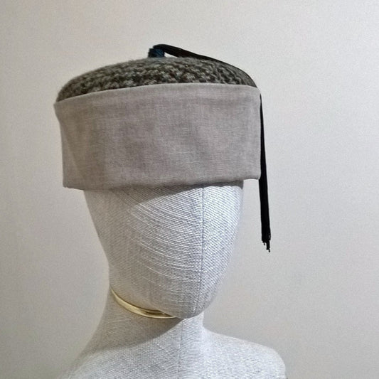 Brown and beige Harris Tweed Smoking Cap with blue and black tassel