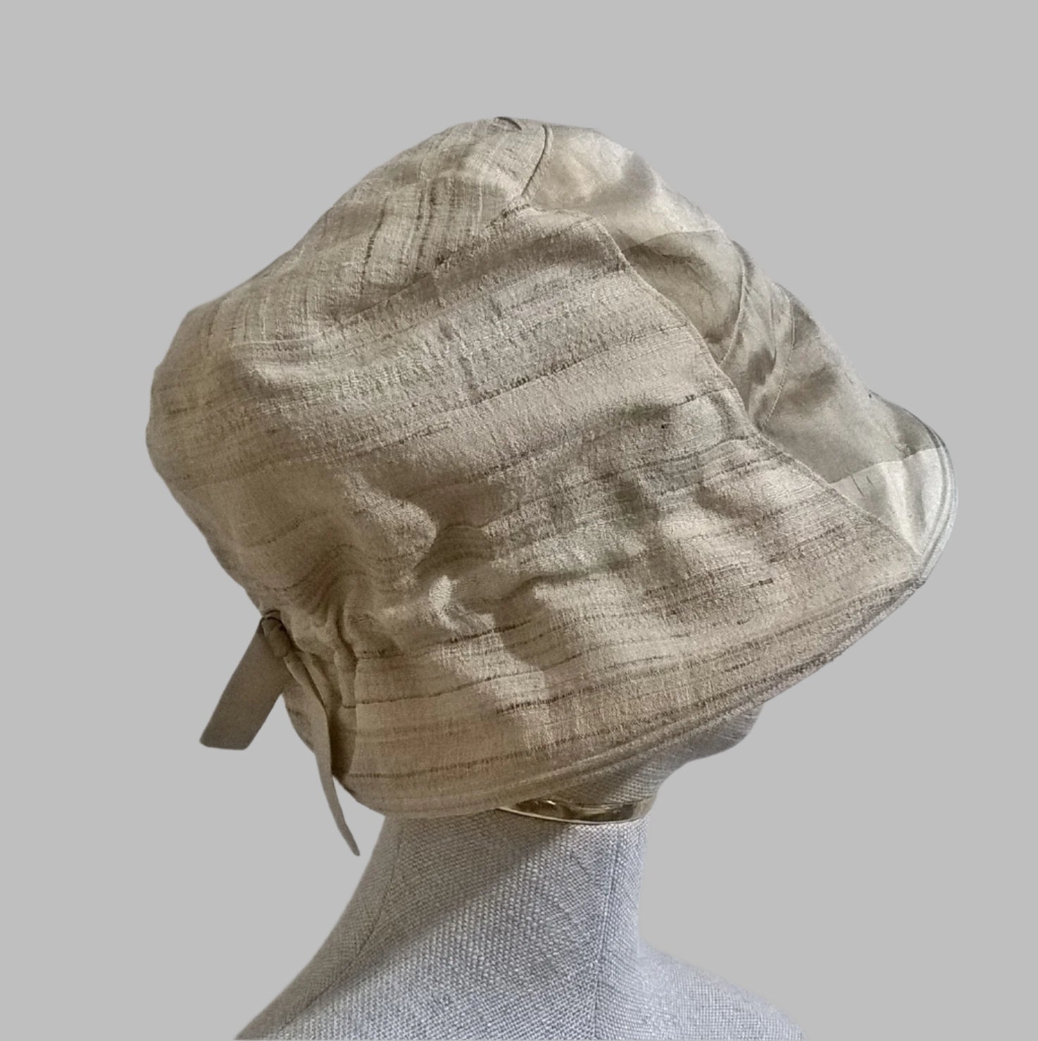 The bonnet style back of the bucket hat means there is room for a bun or ponytail 