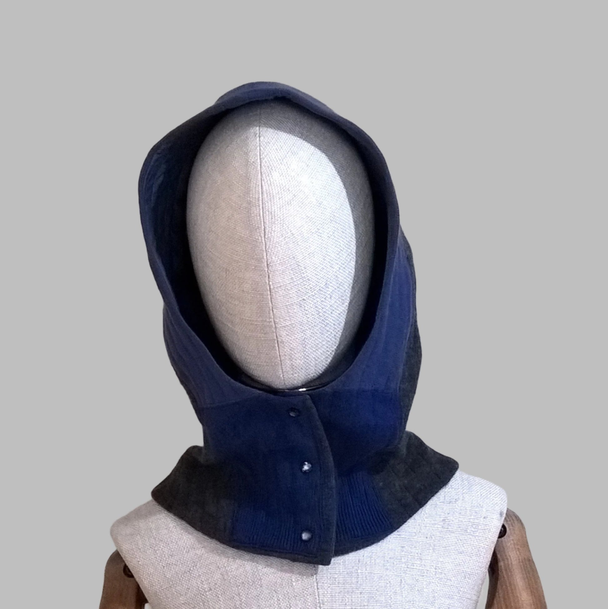 Cashmere quilted hood with front button closure