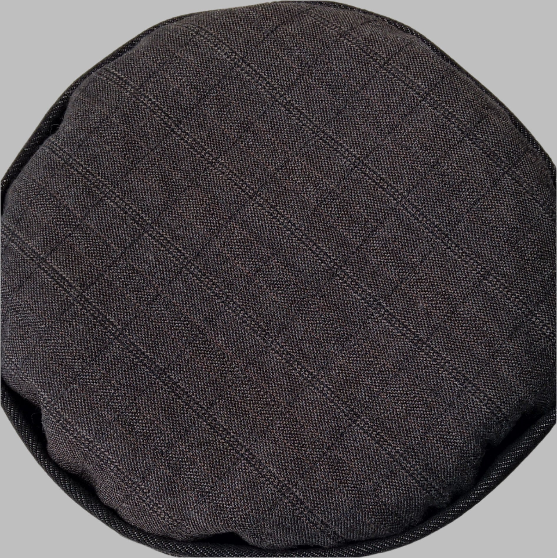 Close up view of the tip as the pinstripe wool cashmere fabric is quilted to fine bamboo cotton wadding and shrunk to give a slightly puffy antique quilt look
