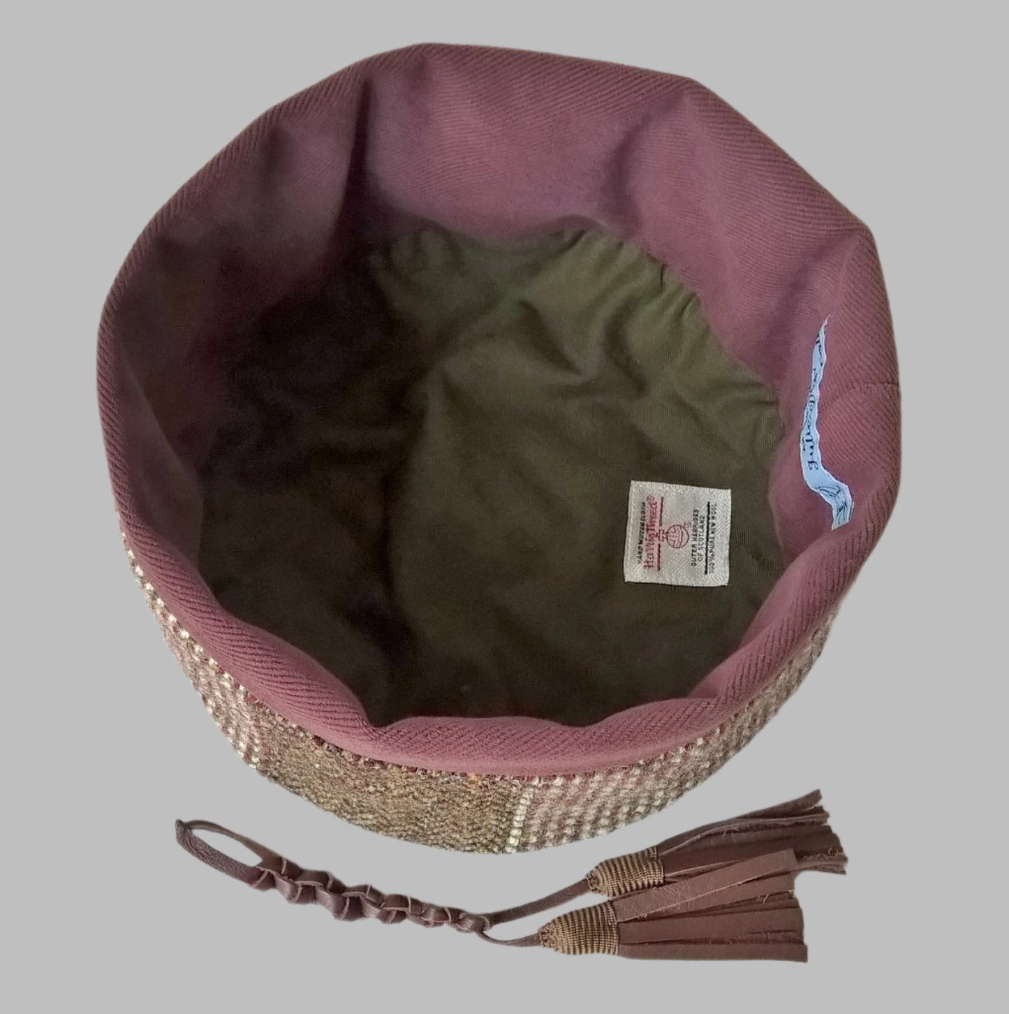 Cotton lining of Harris Tweed smoking cap with removable tassel