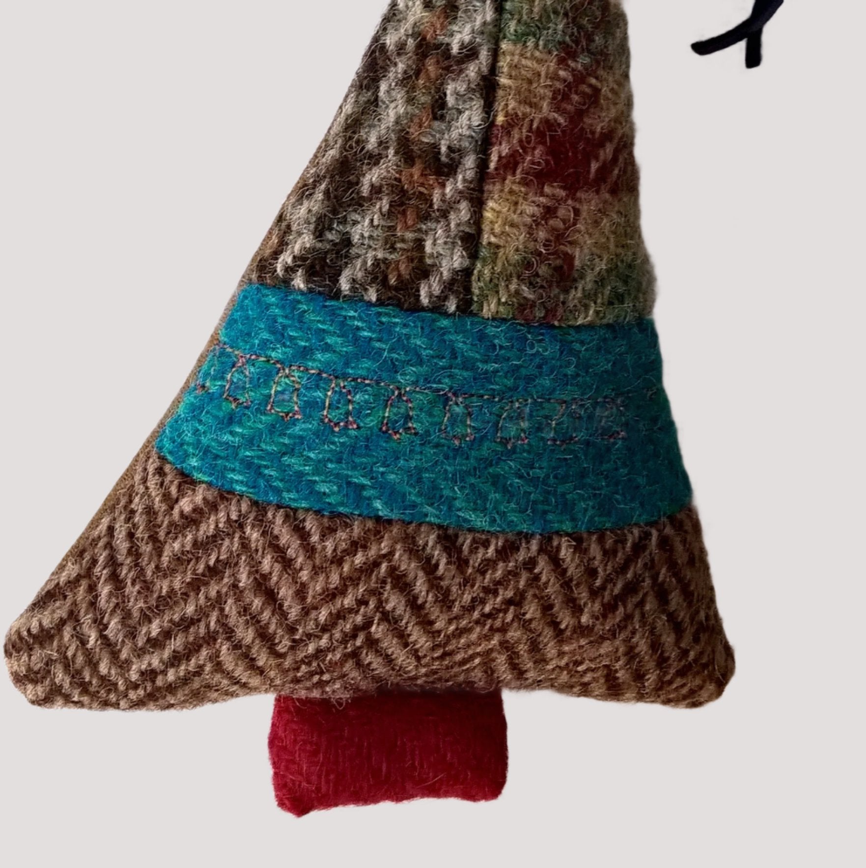 Embroidered bells on centre tweed in gold