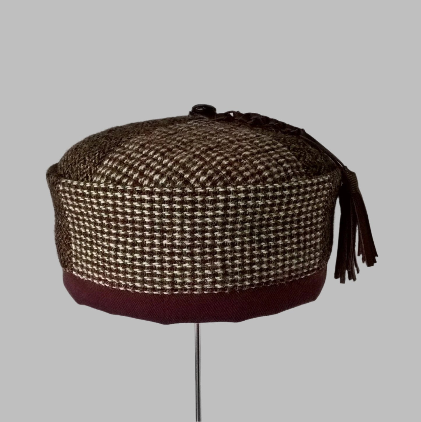 Front view of patchwork Harris Tweed smoking cap handmade from up-cycled  vintage jackets