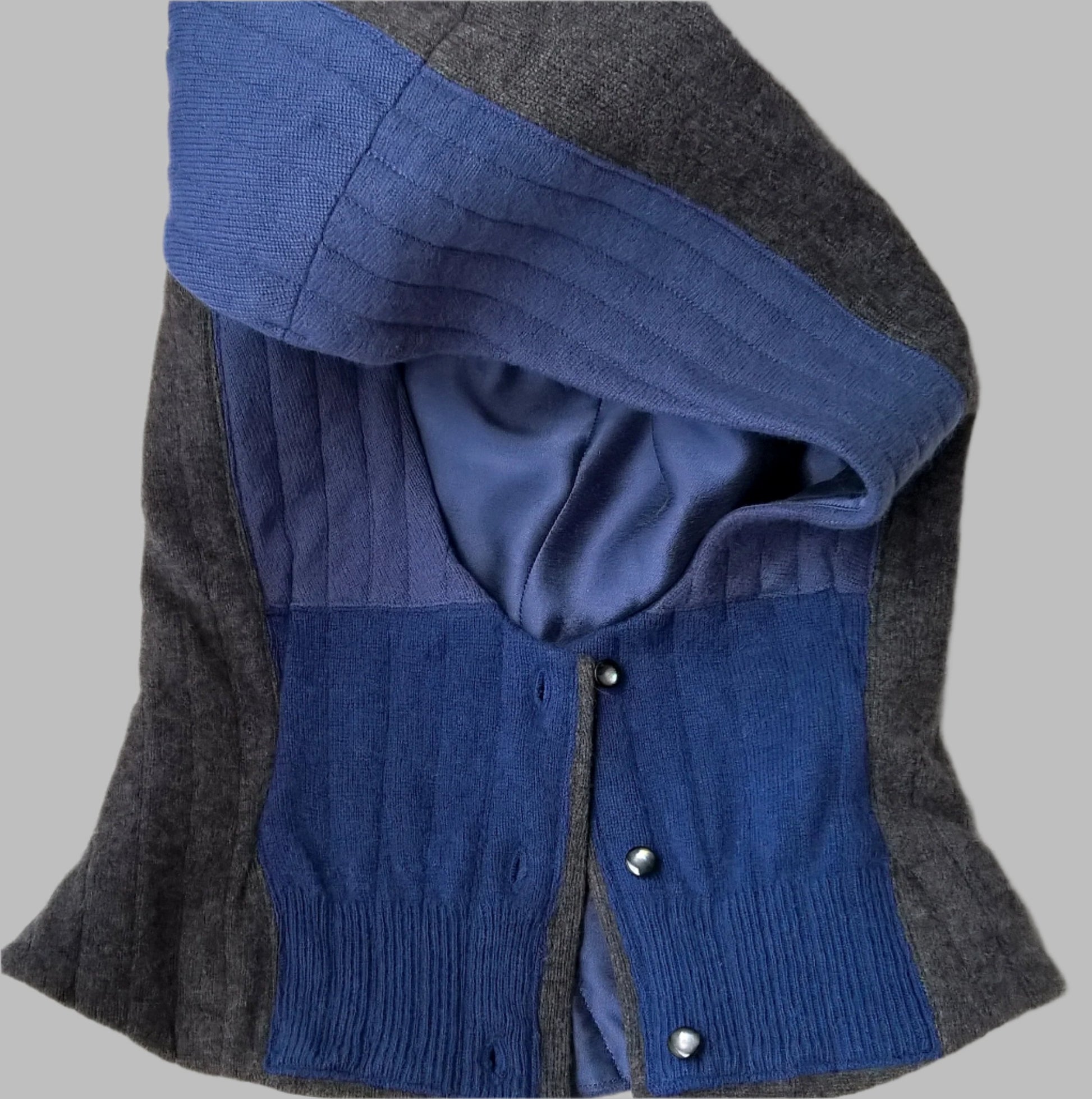 Cashmere patchwork quilted hood with button front fastening