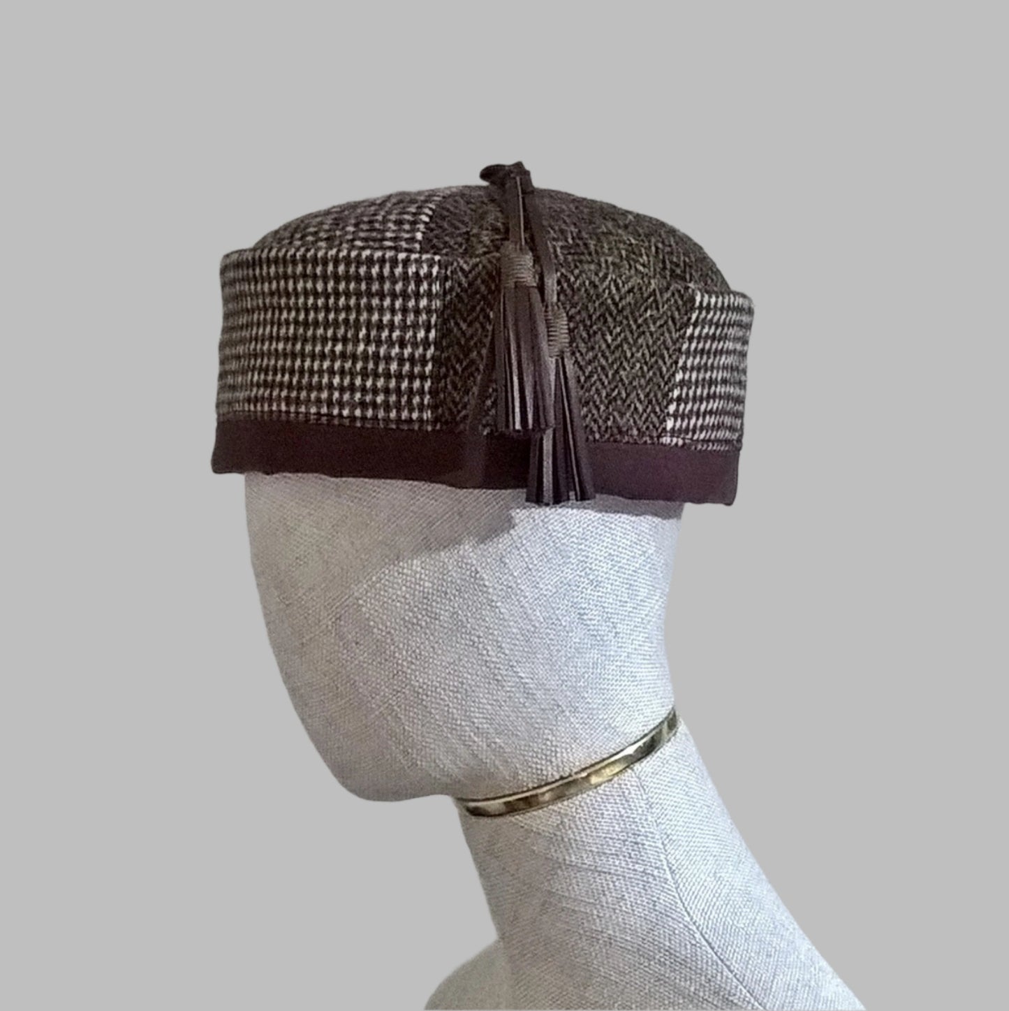 Harris tweed pillbox hat with leather tassel