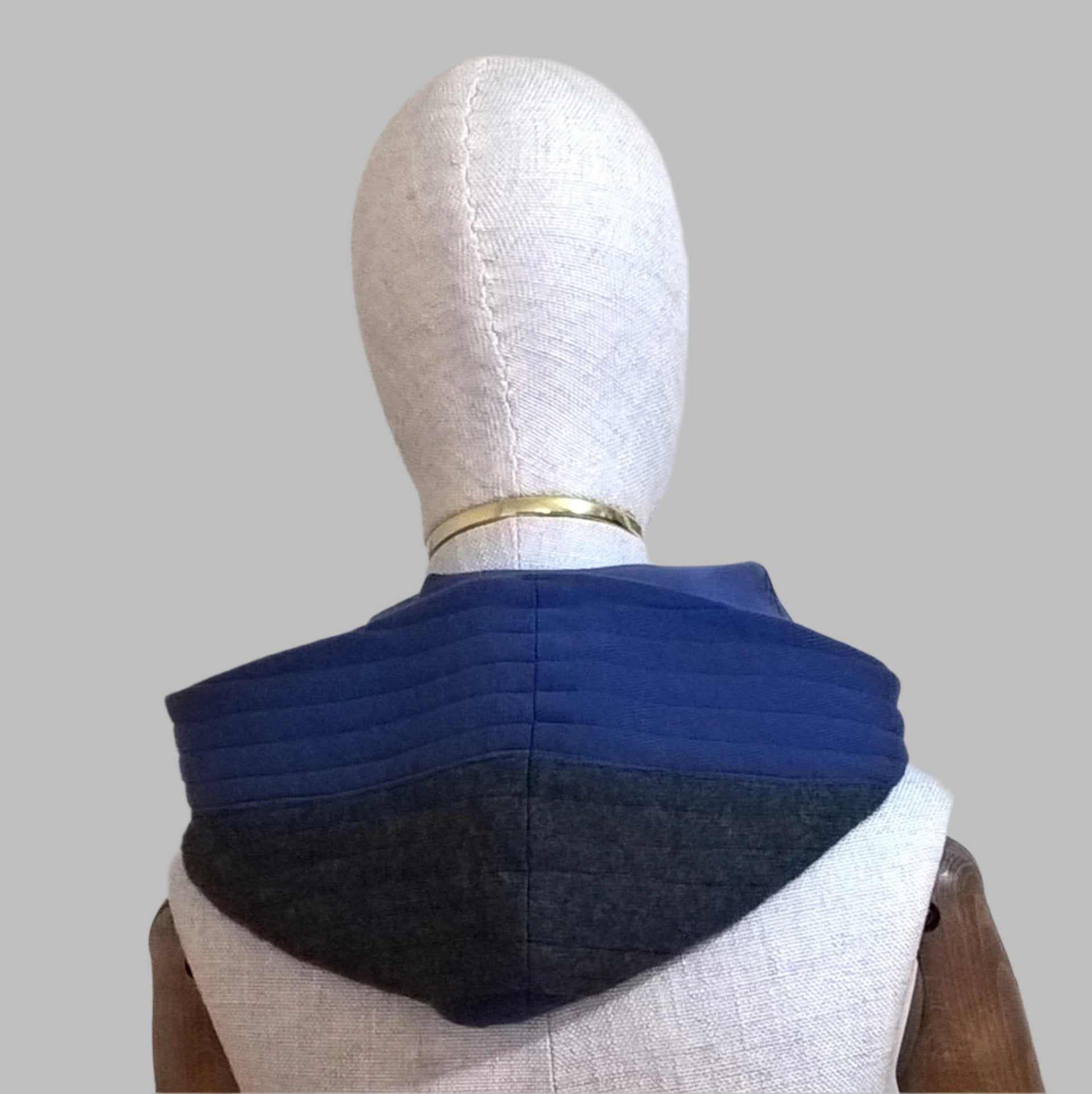 Hood sits around the neck when worn down