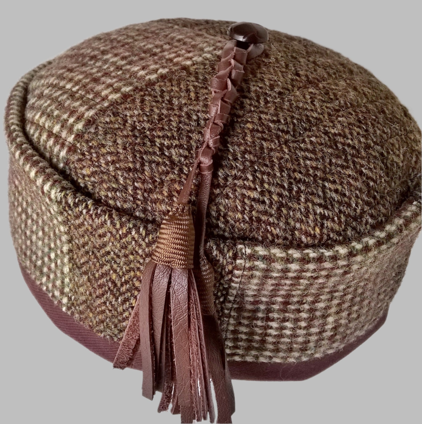 Mismatched Harris Tweed patchwork smoking cap with macrame leather tassel 