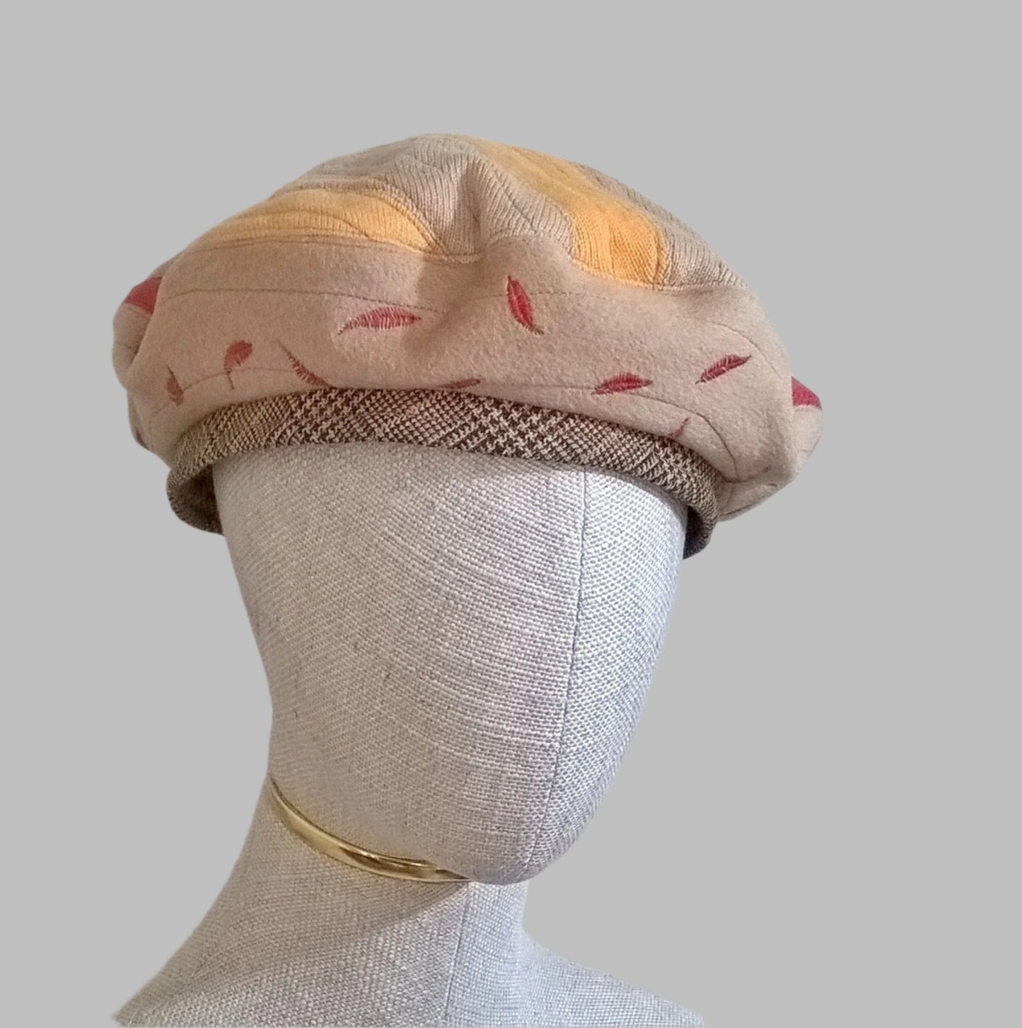 Quilted patchwork beret handmade in fawn, red and yellow cashmere with wool check trim and leaf embroidery