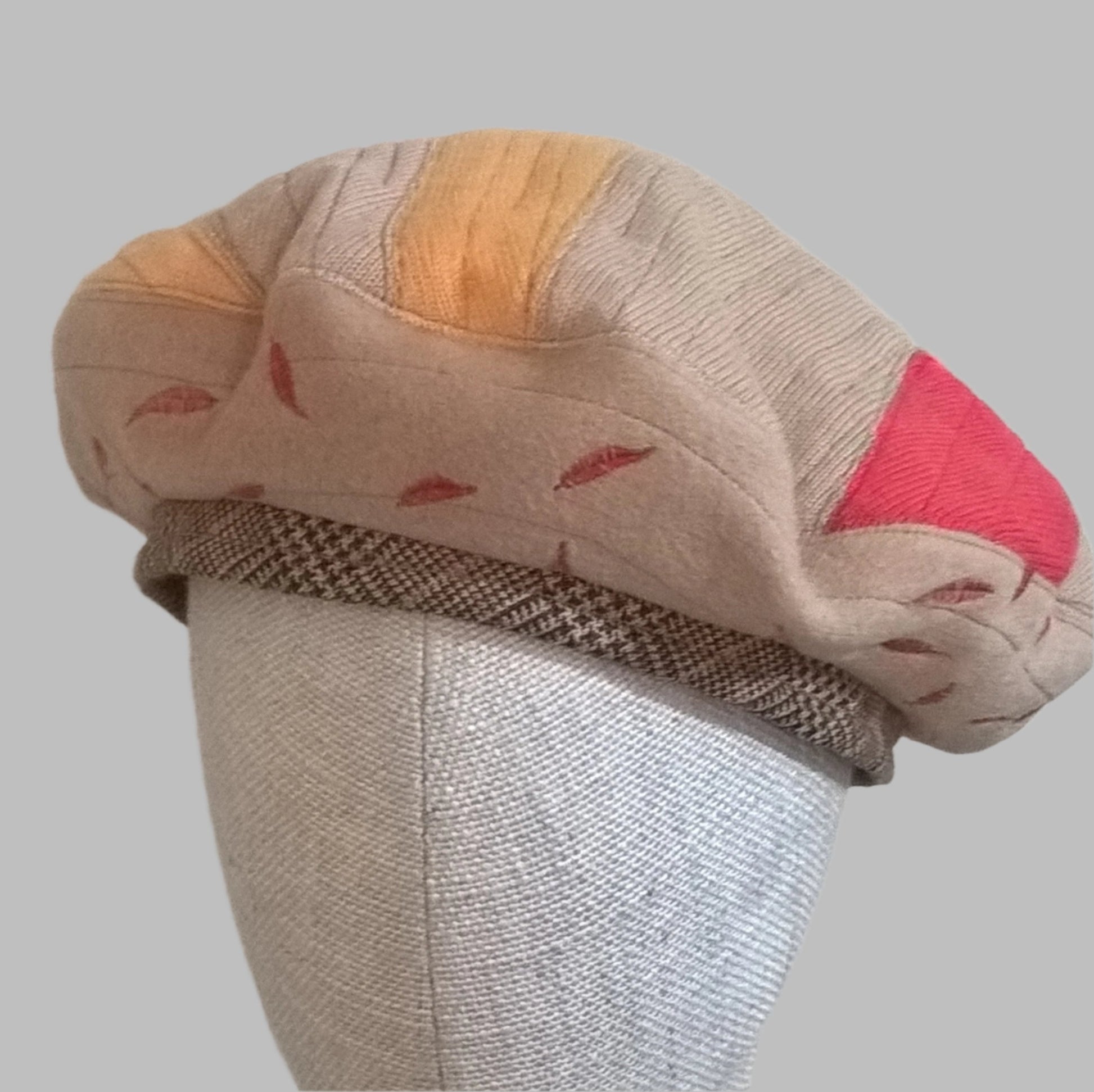 Multi coloured cashmere beret handmade from upcycled sweaters and coat