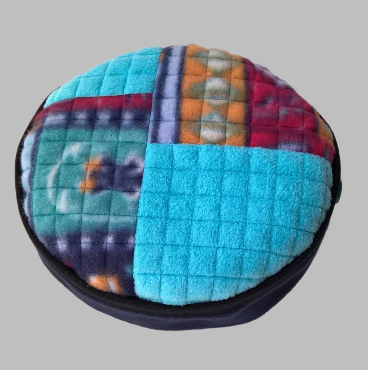 Multi coloured patchwork tip of brimless fleece unisex cap