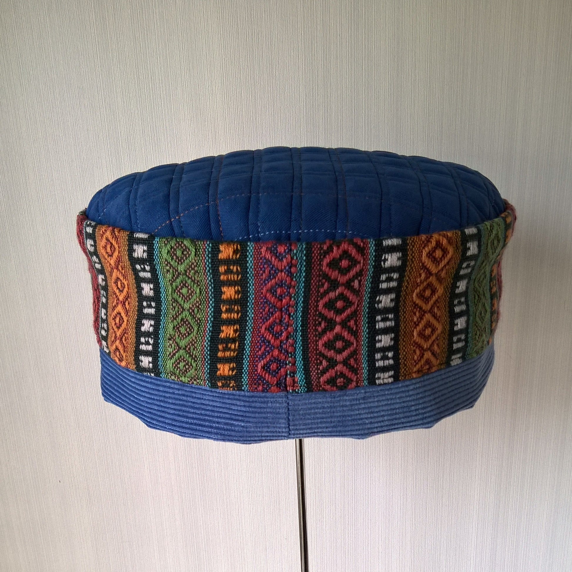 Back view of multi coloured stripe cap