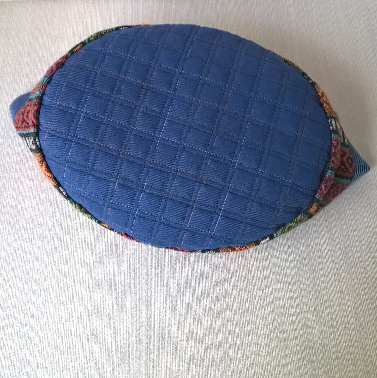 The quilted tip has contrast stitching