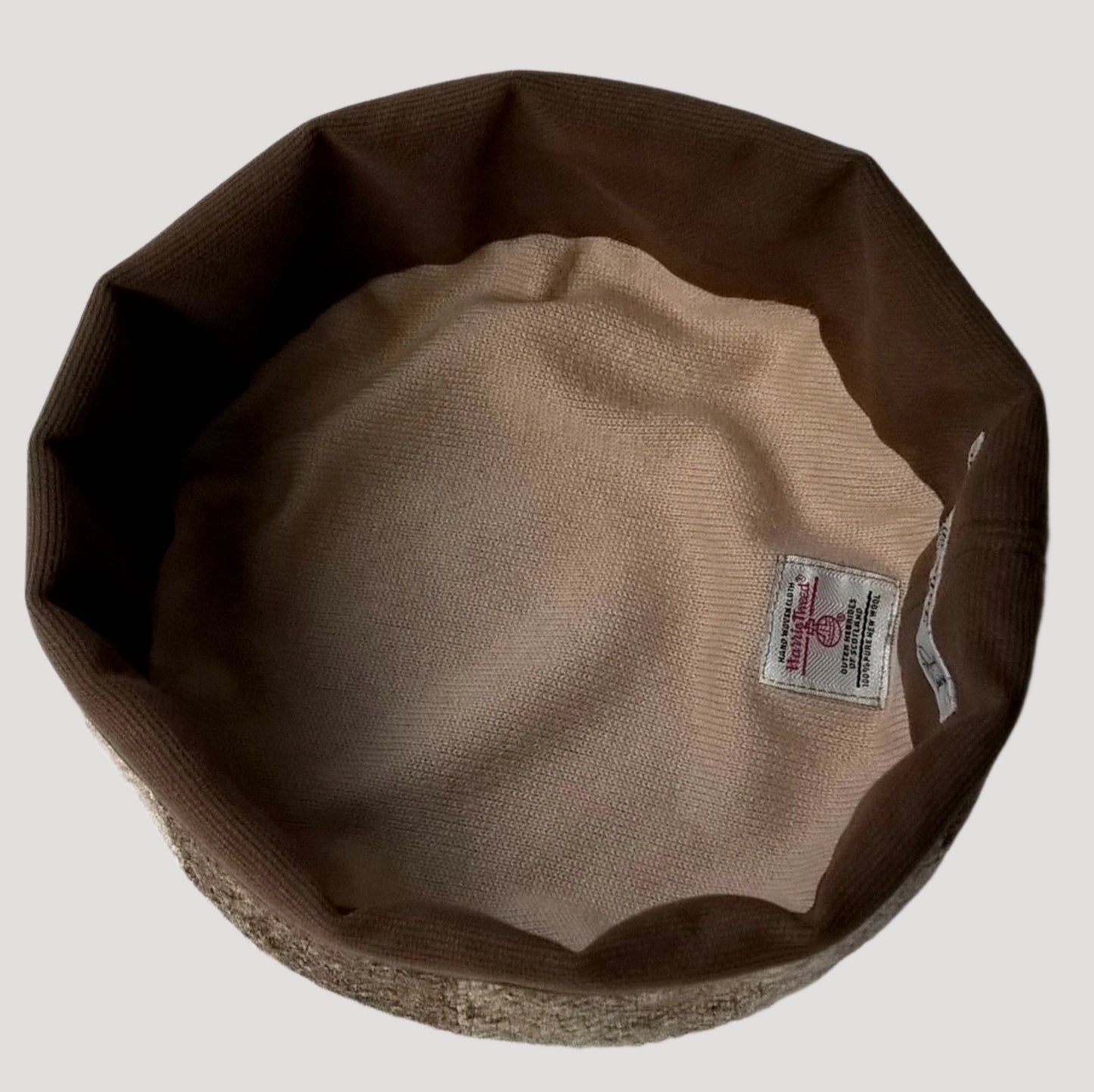 The lining of the hat is half brushed cotton with the tip being lined with knitted pure cashmere 