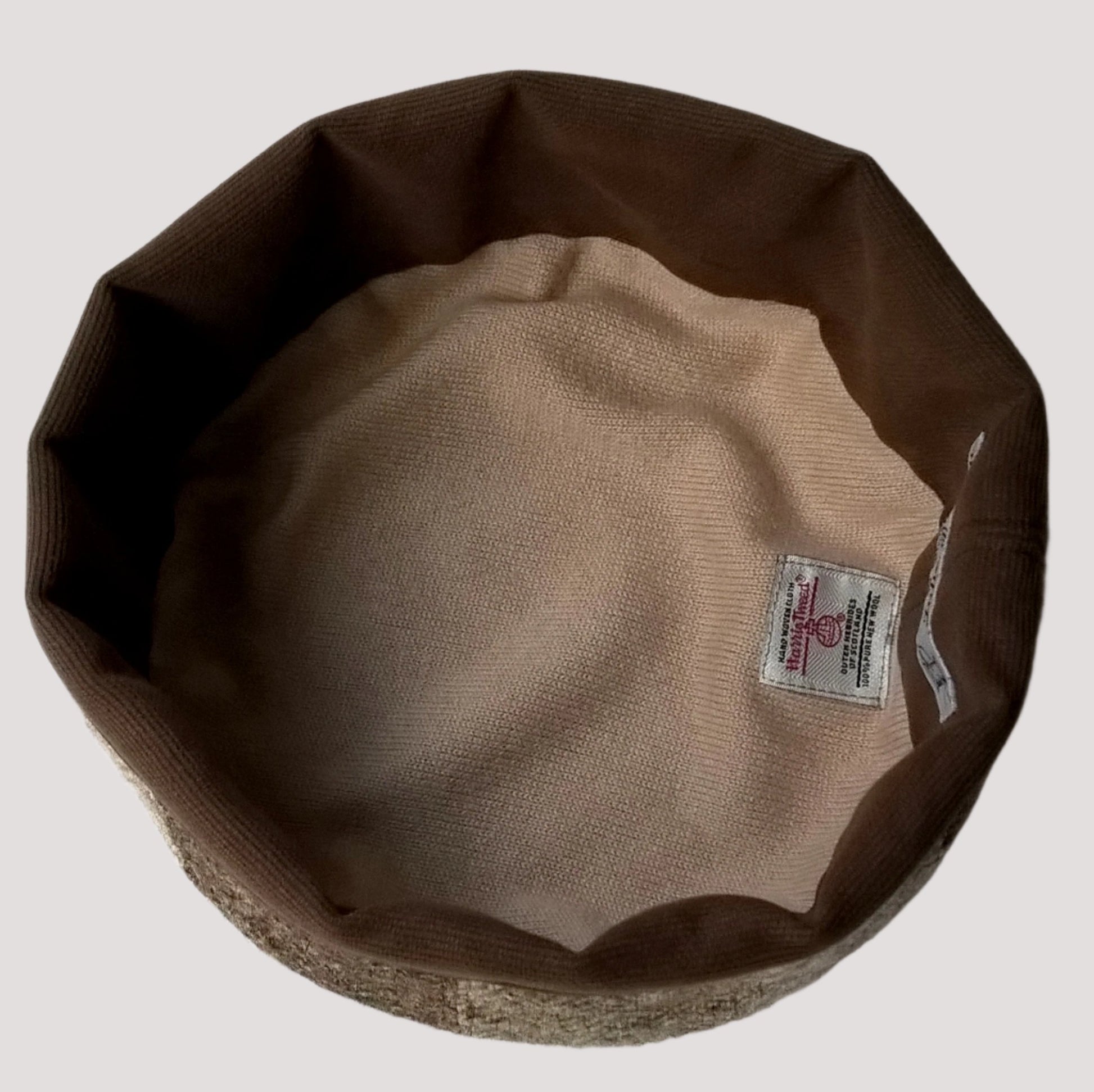 The lining of the hat is half brushed cotton with the tip being lined with knitted pure cashmere 