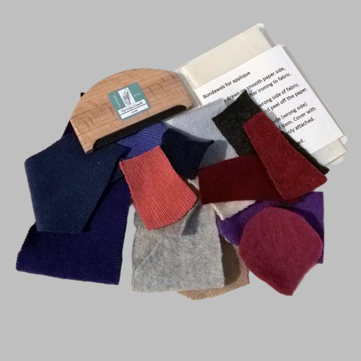 Pure cashmere knitted pieces for patching and applique in various colours, with cashmere comb to remove bobbling and a small piecs of bondaweb 