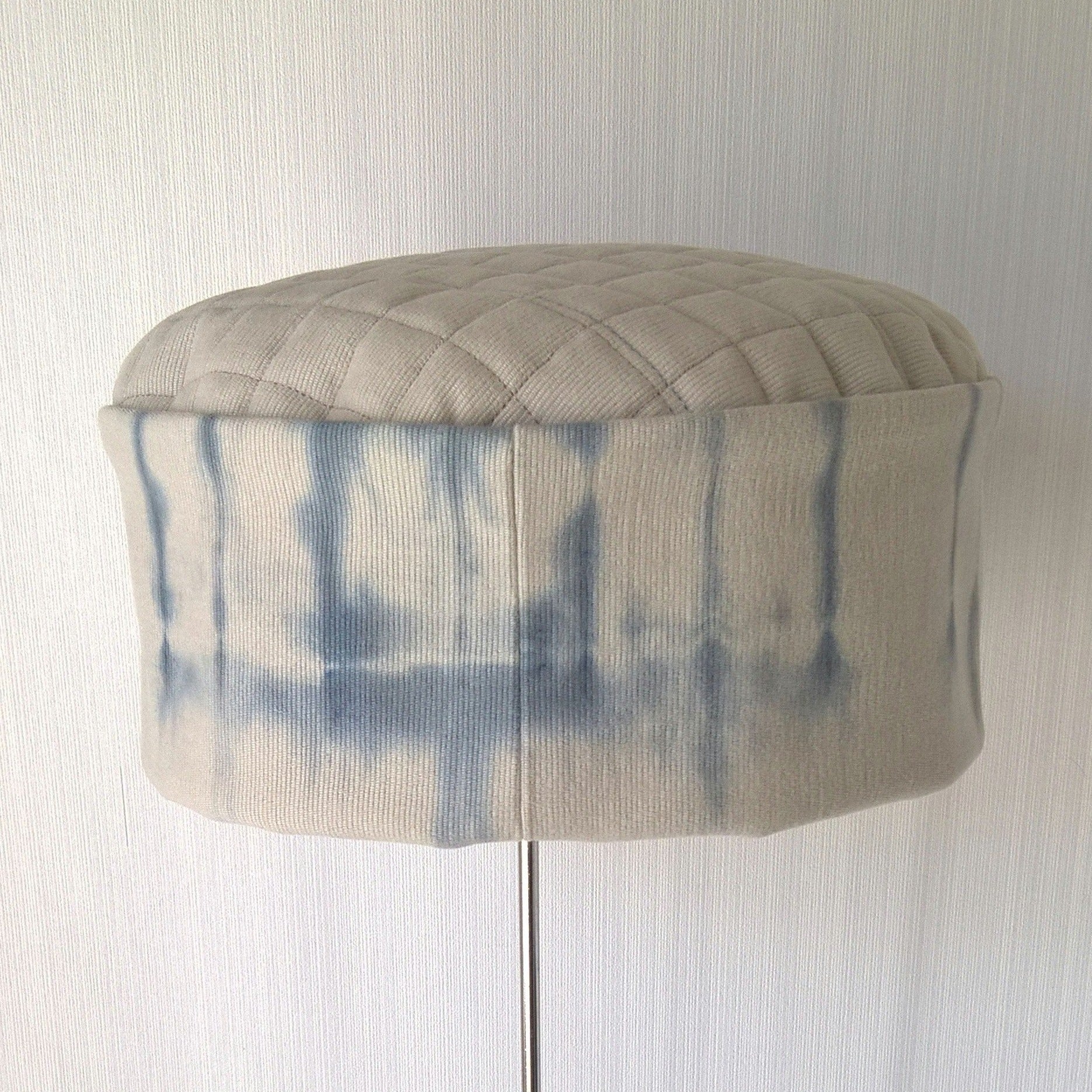 Back view of putty and blue tie dye hat