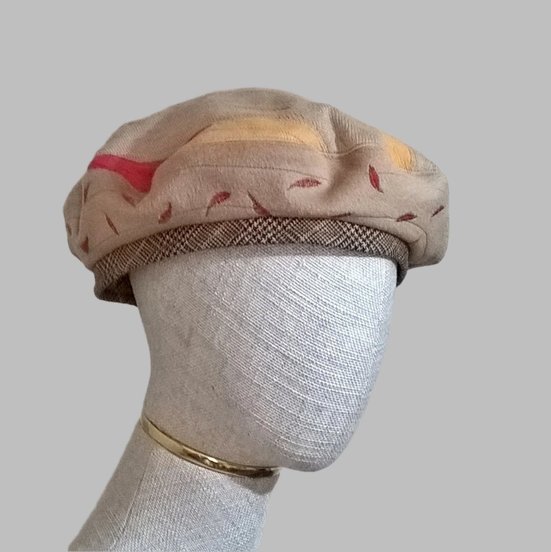 Quilted patchwork beret with red leaf embroidery