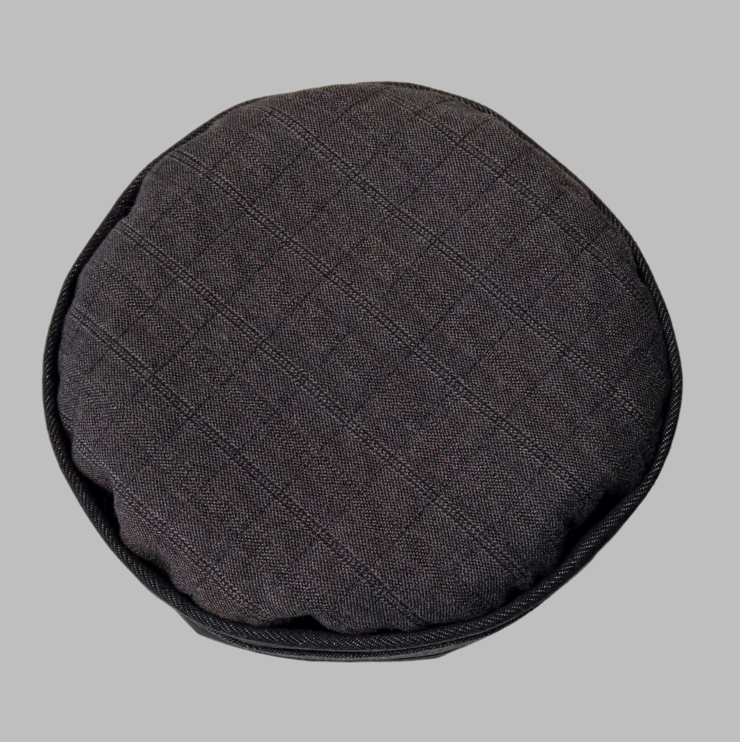 The pinstripe wool cashmere fabric is quilted to fine bamboo cotton wadding and shrunk to give a slightly puffy antique quilt look