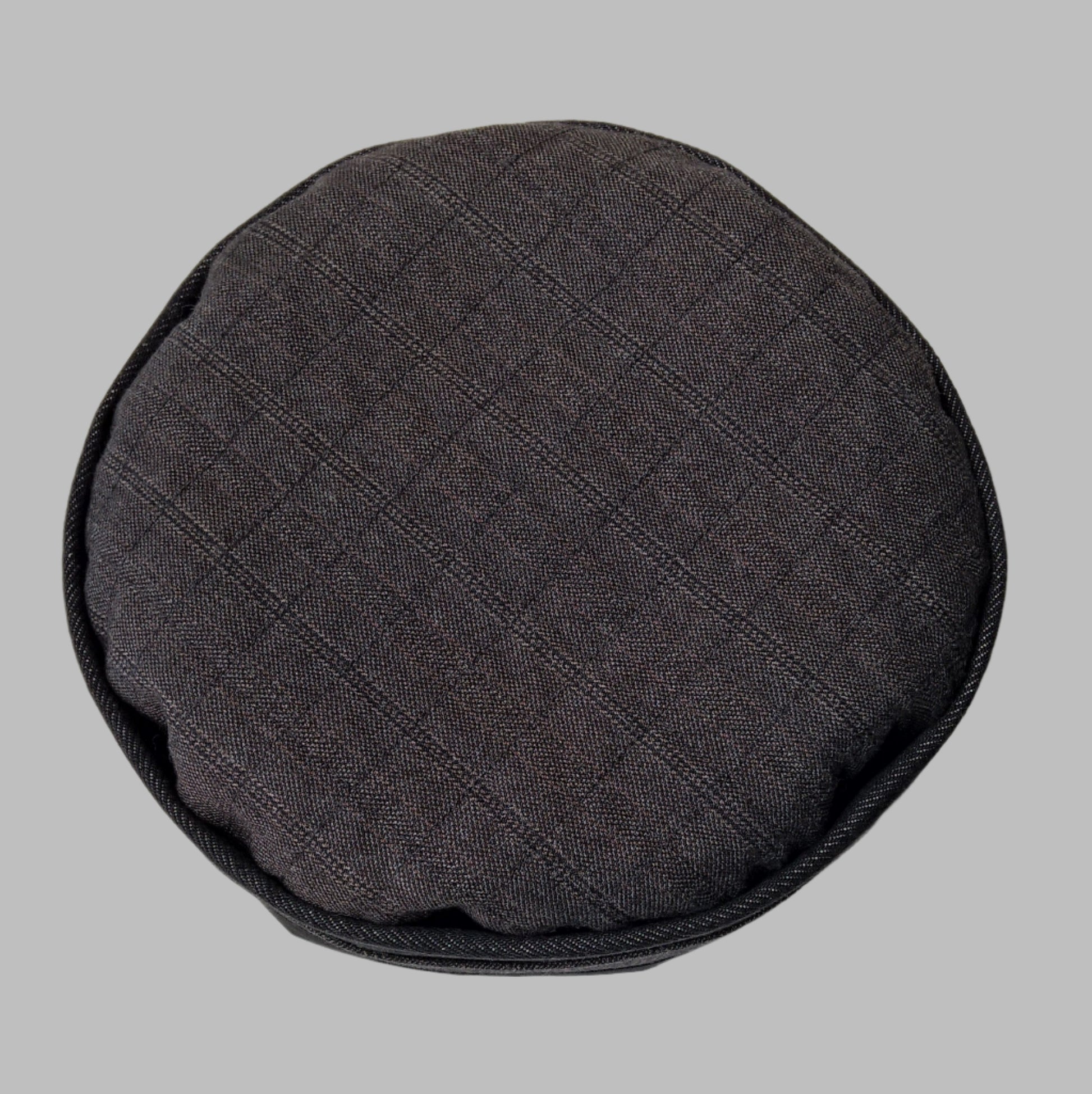 The pinstripe wool cashmere fabric is quilted to fine bamboo cotton wadding and shrunk to give a slightly puffy antique quilt look