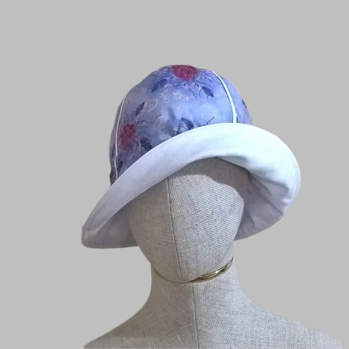 The bucket hat can be worn with one side of brim rolled up