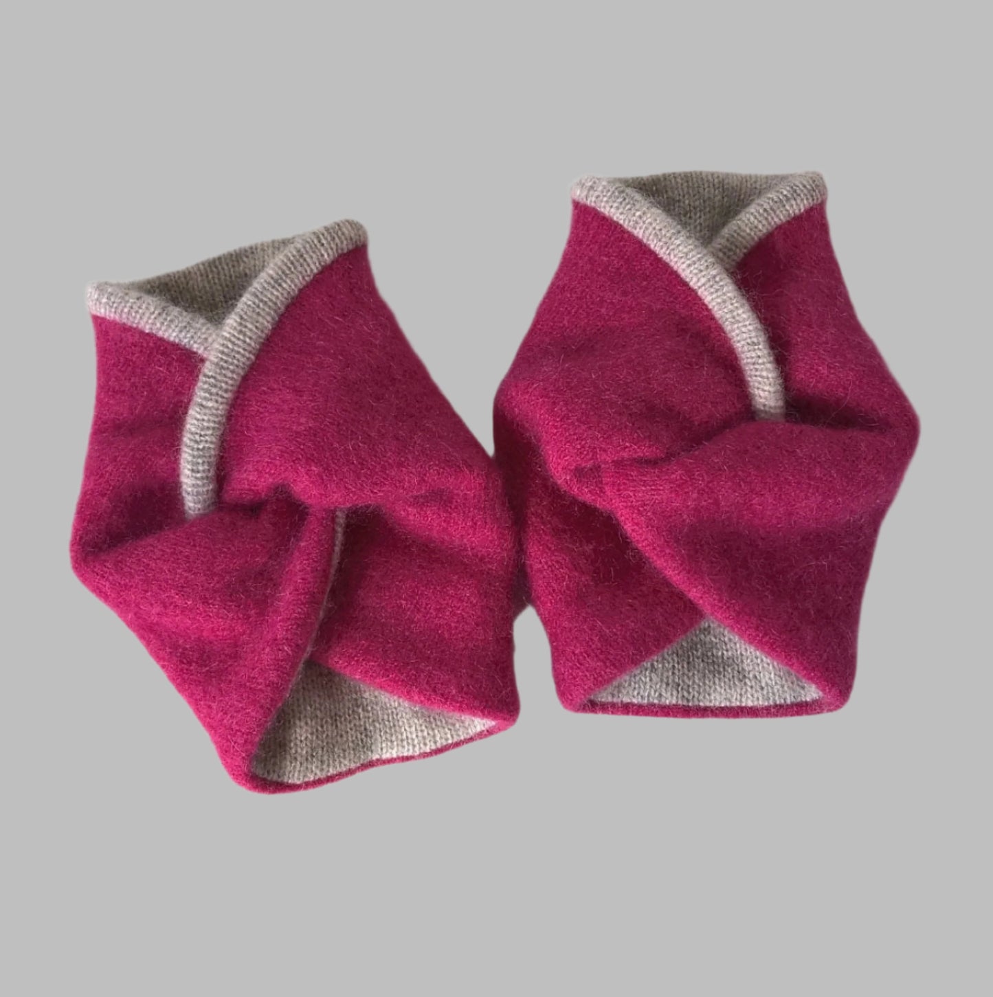 Felted raspberry pink cashmere edged and lined with grey cashmere