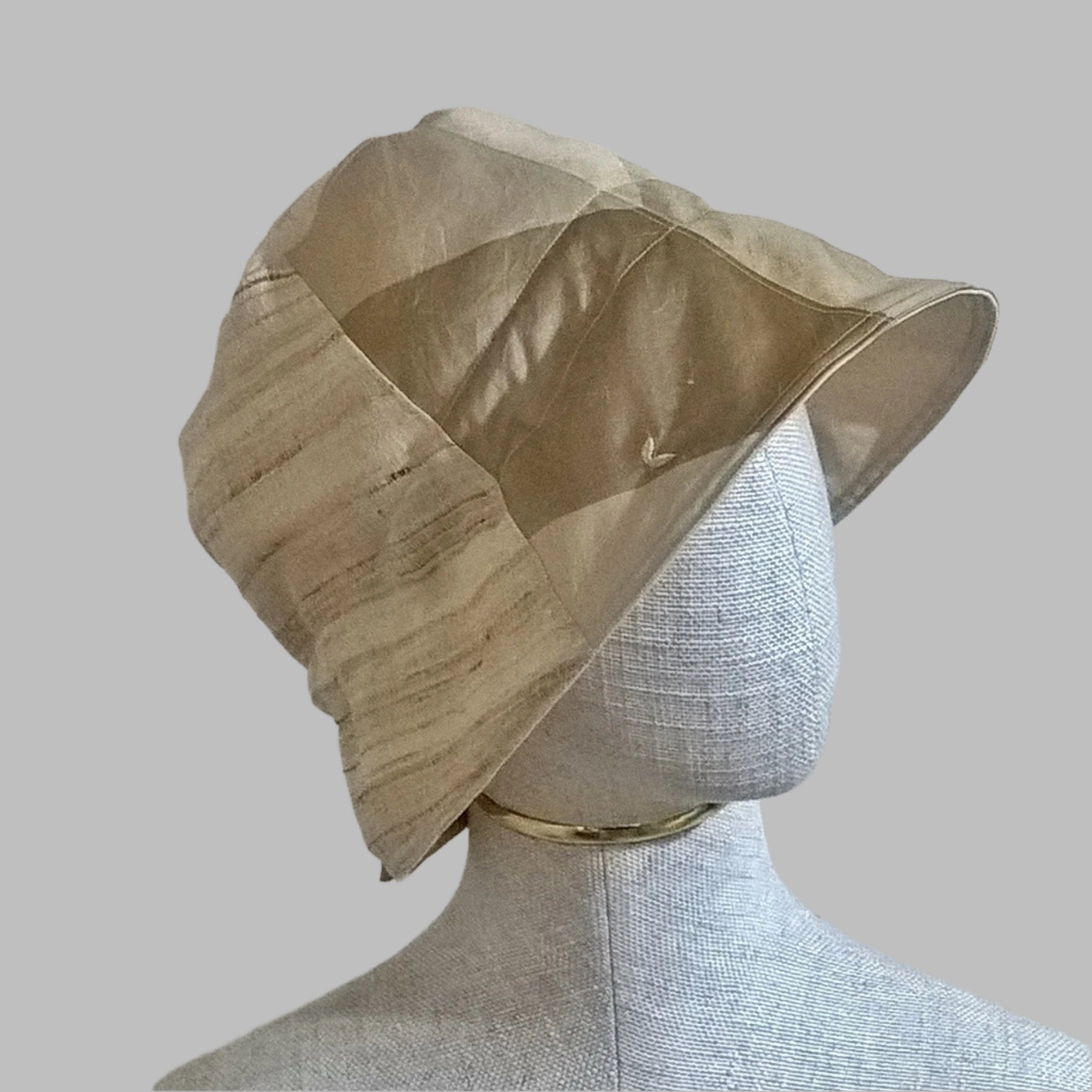 Raw silk bucket hat cotton lined with adjustable tie detail at the back