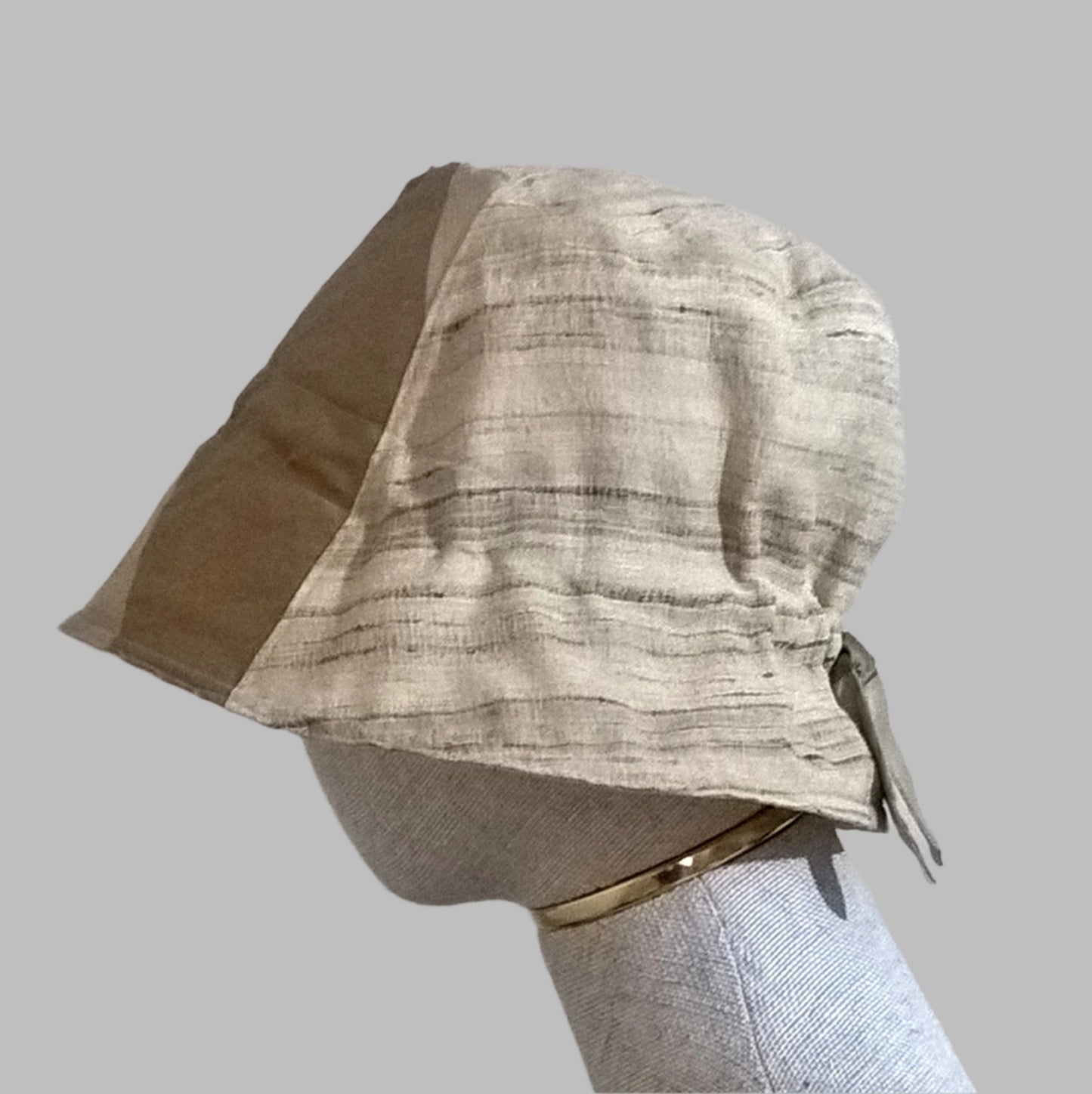 Bell shaped bucket hat handmade with raw and satin silk, lined with cotton.
