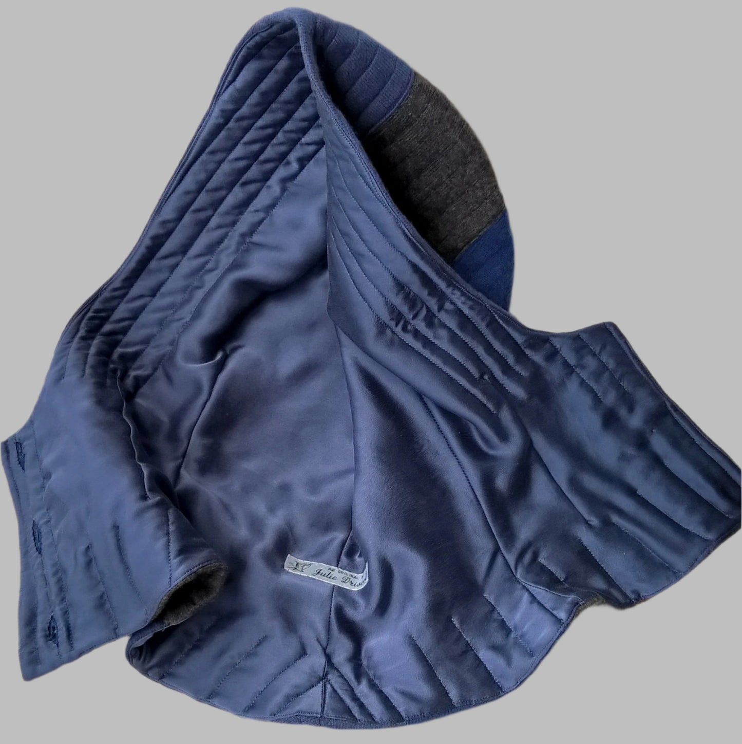 Hood has part quilted silk lining