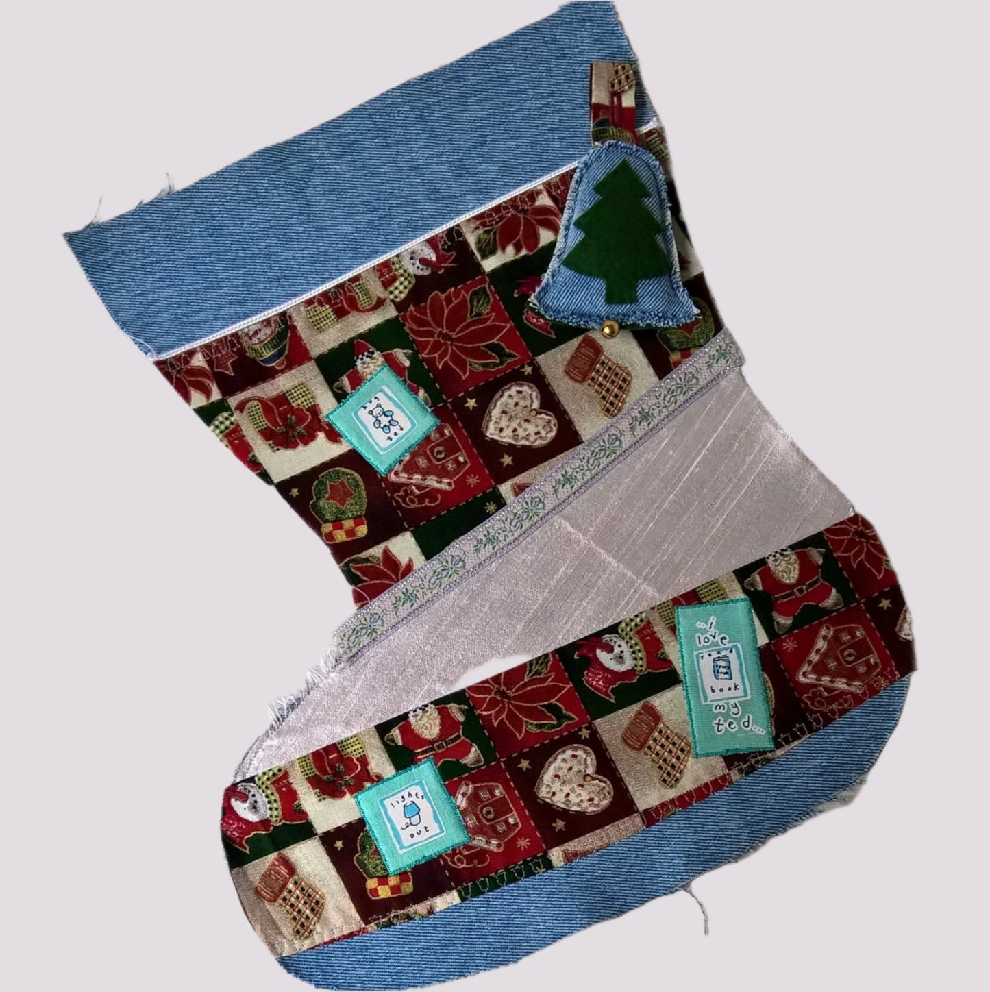 Stonewash Christmas stocking given a traditional feel with patch work and applique
