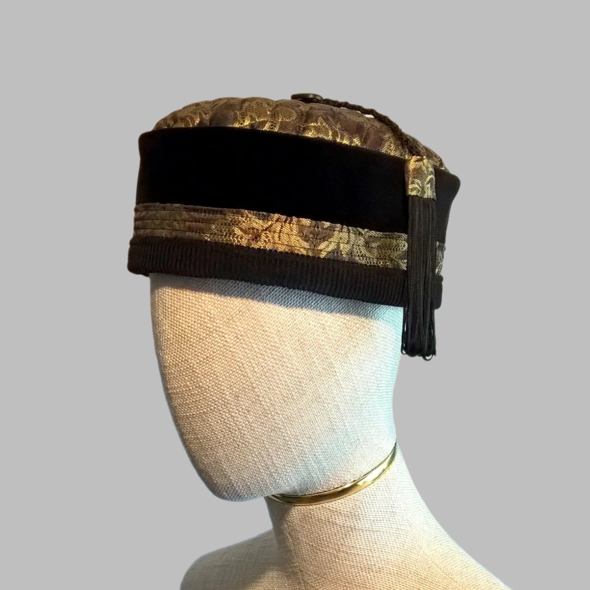Black velvet and gold brocade smoking cap with quilted tip, vintage button and macrame tassel