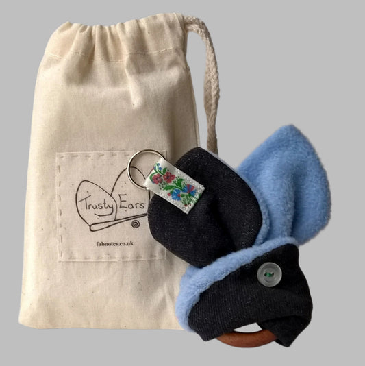 Trusty ears key-ring handmade in black denim and pale blue soft fleece, with added details of vintage floral ribbon and button eye.   Comes with Trusty Ears cotton bag