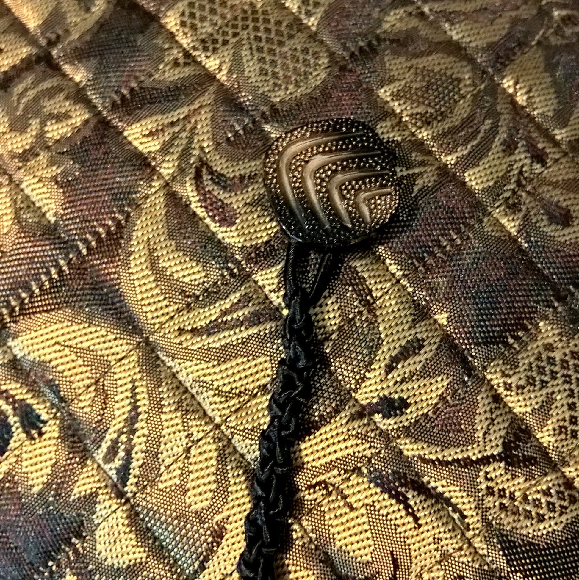Vintage button on quilted gold brocade tip for removable macrame tassel