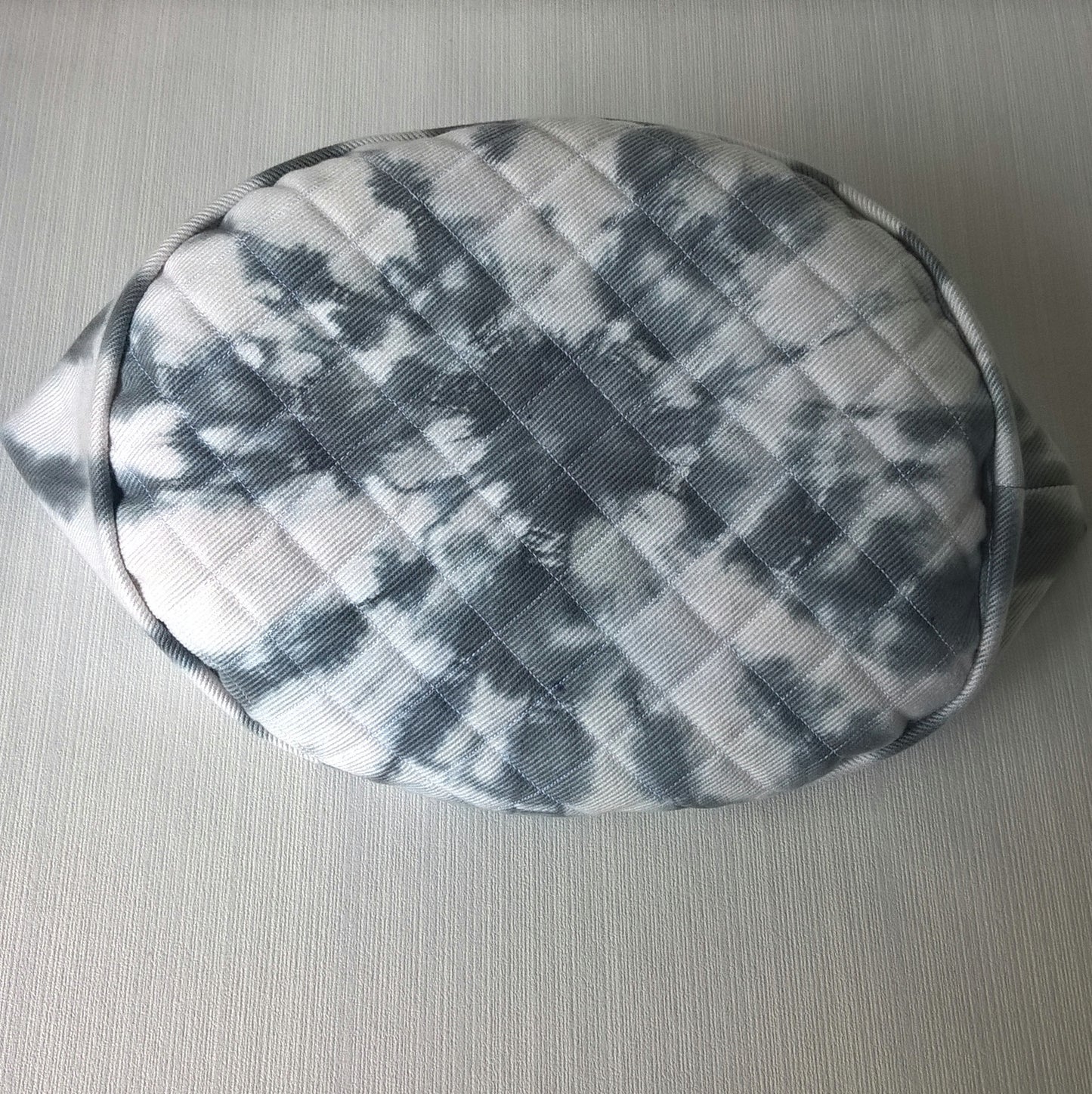 White cap with black tie dye detail