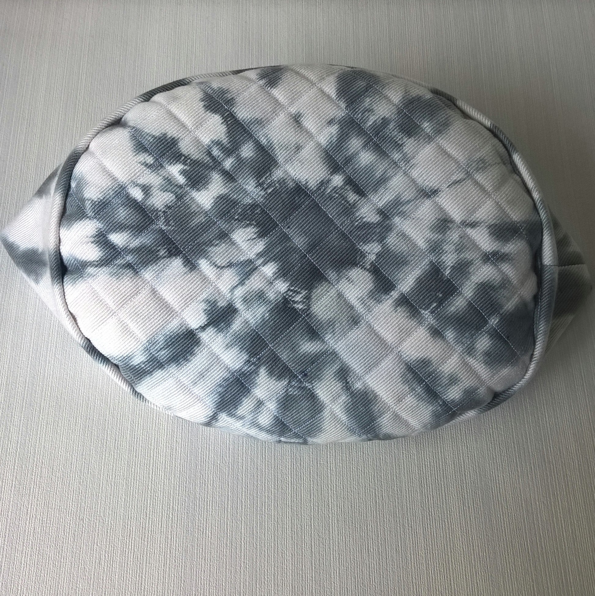 White cap with black tie dye detail