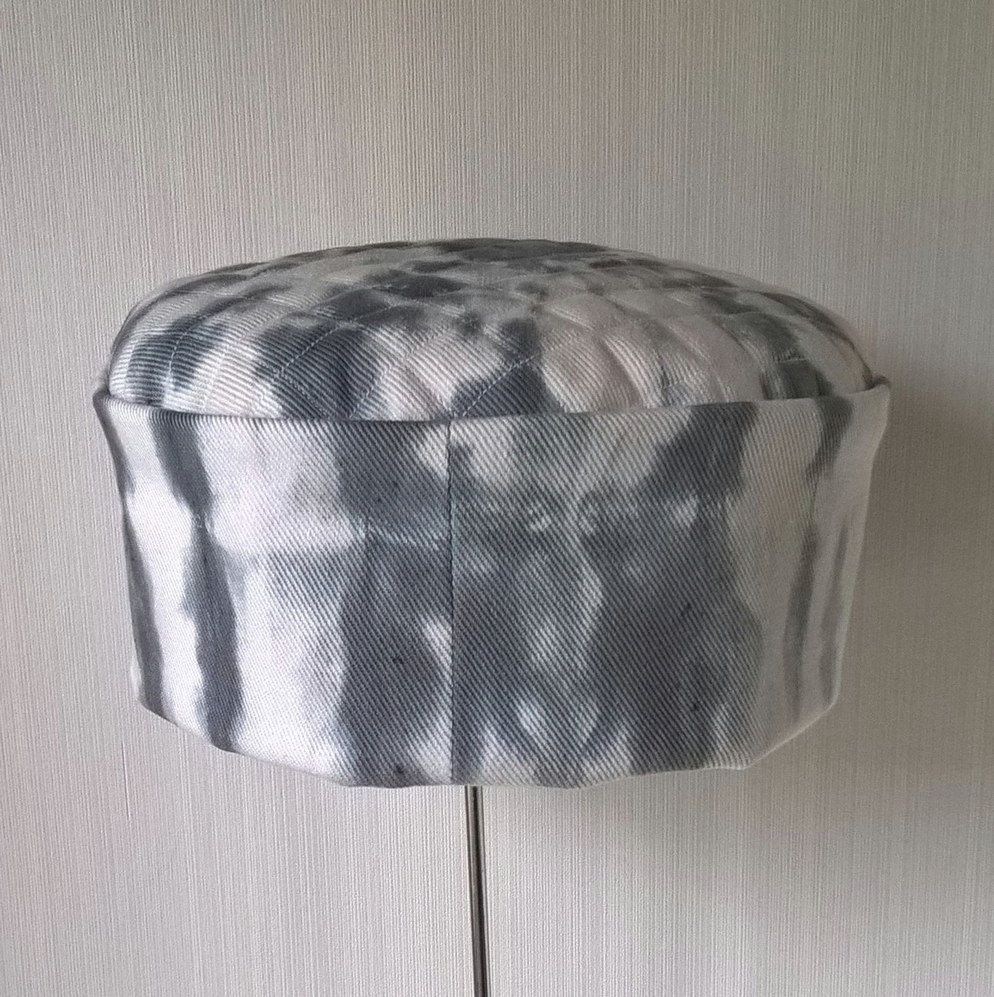 Back view of white and black tie dyed hat