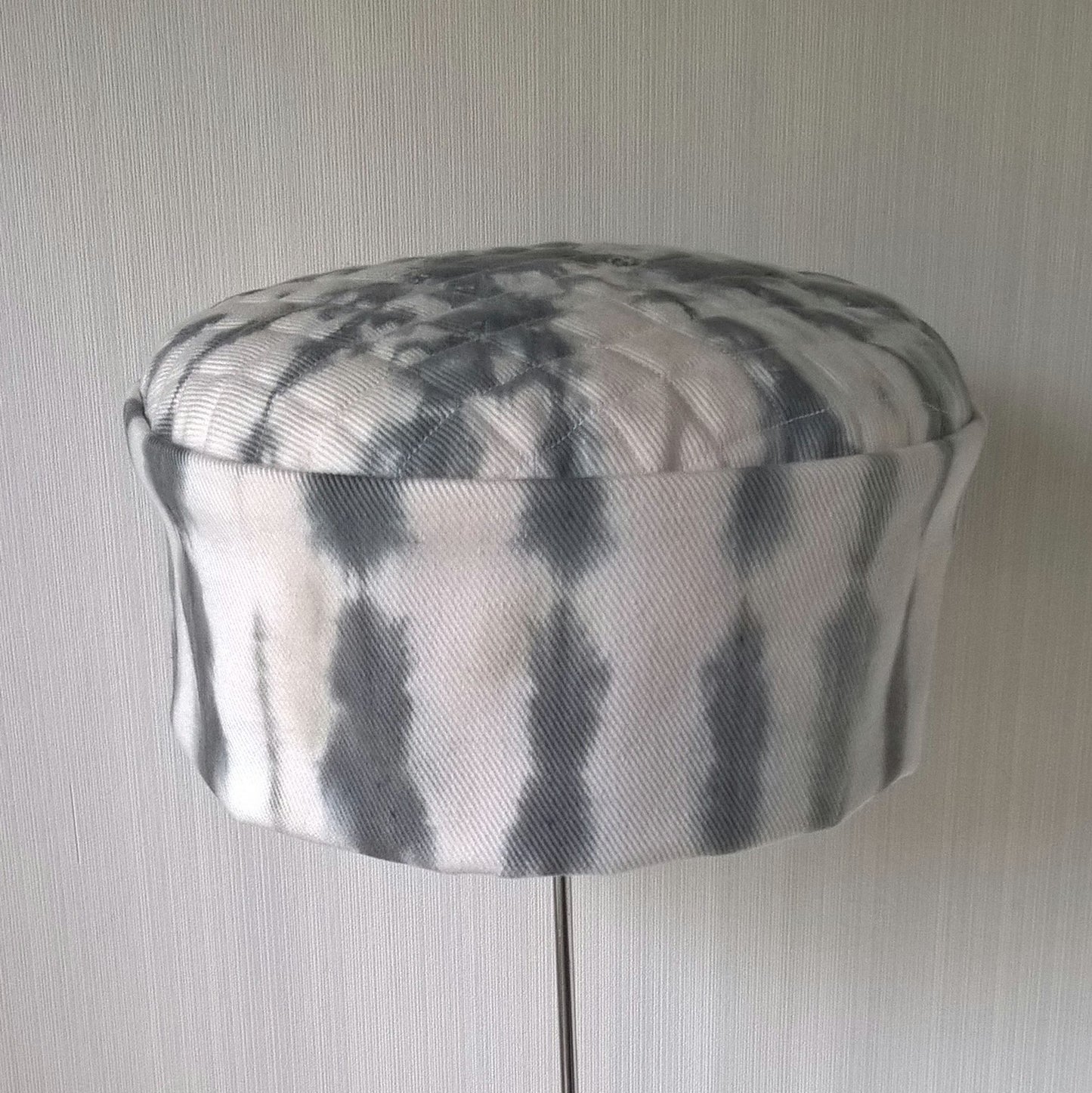 Front view of white cap with black shibori tie dye