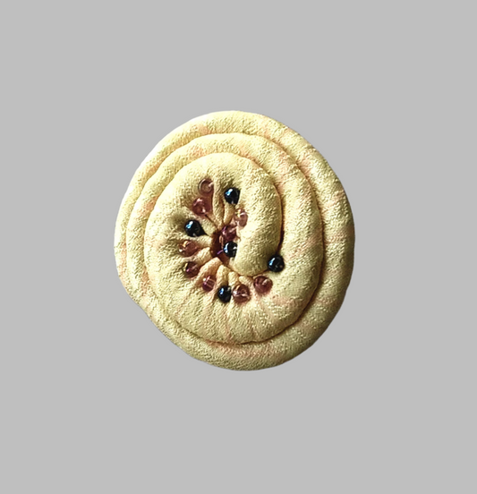 Lemon Japanese silk lapel pin in a shell design with beading