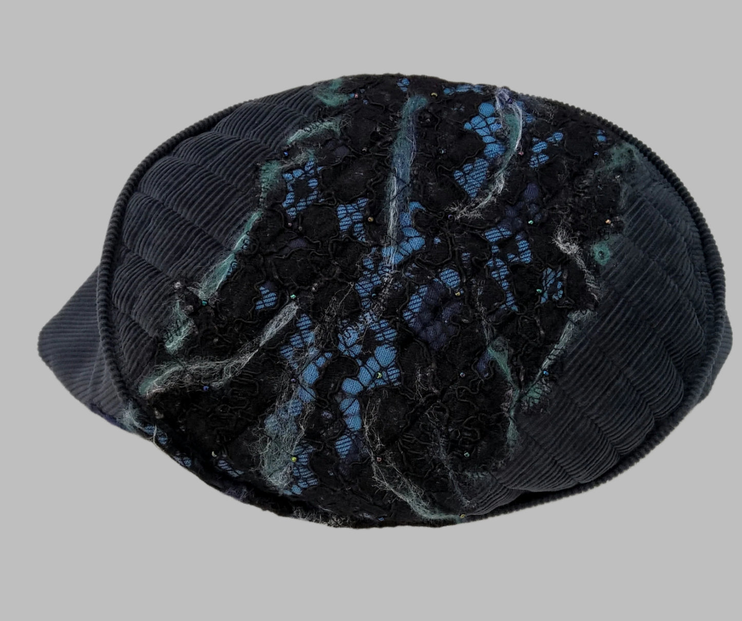 Dark cyan blue nuno felted smoking cap